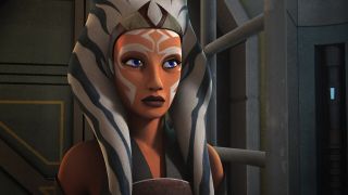 Still from the T.V. show Star Wars Rebels. Here we see a more grown-up adult Ahsoka (orange face with white markings and blue and white stripped head tails). Her face is a bit longer and less round.