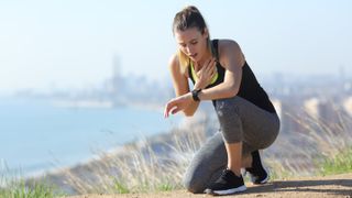 Upset runner checking GPS watch