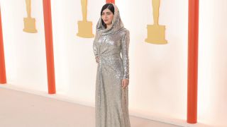 Malala in a sparkly dress and hijab at the 2023 Oscars