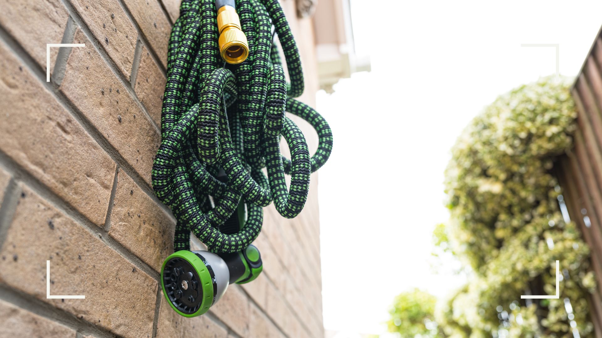 picture of hosepipe hanging on side of home