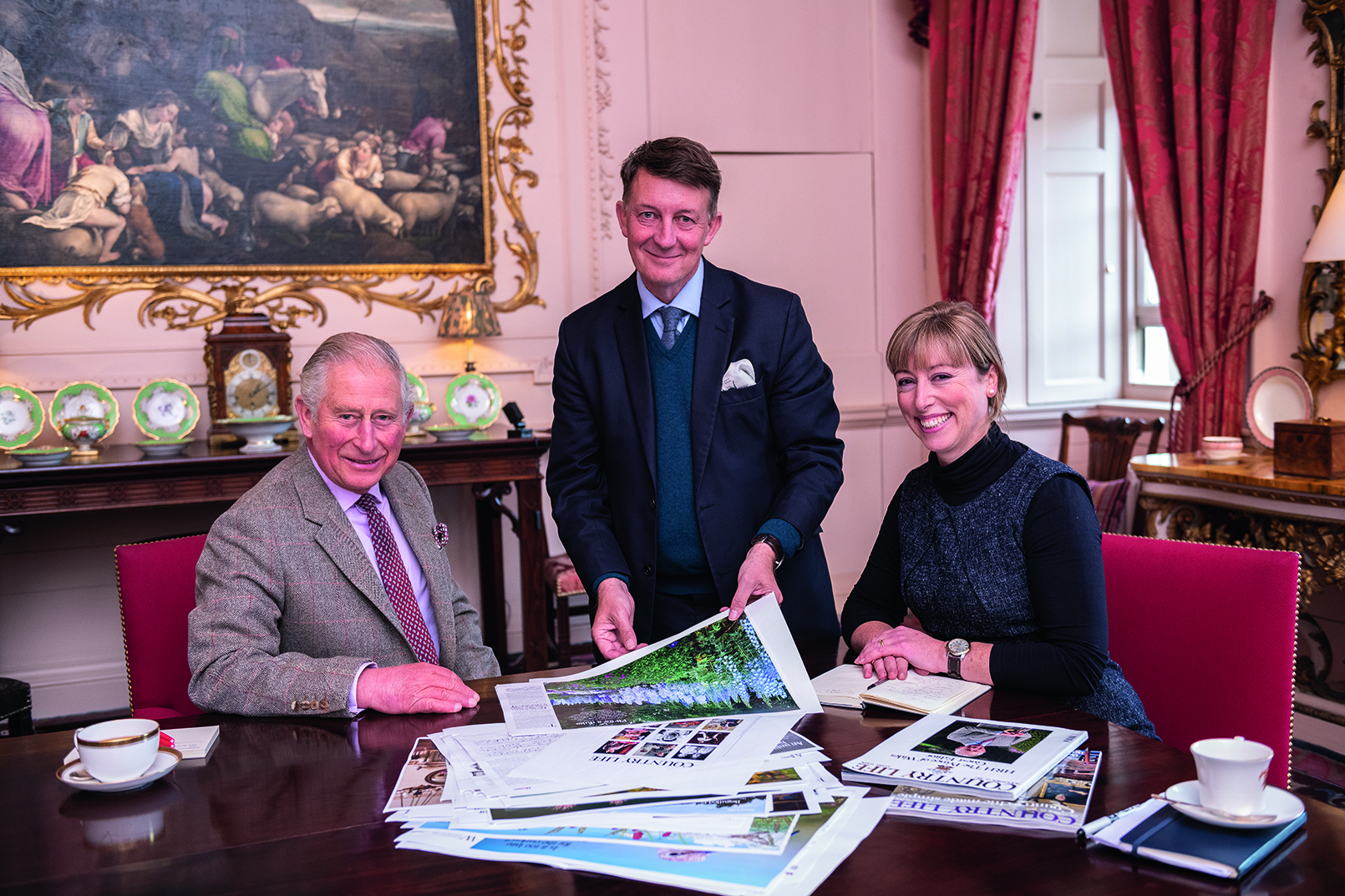 Paula Minchin and Mark Hedges with guest editor HM The King, then the Prince of Wales, in 2018 