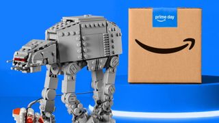 A Lego AT-AT model walks away from a Prime Day cardboard box, placed on a blue podium