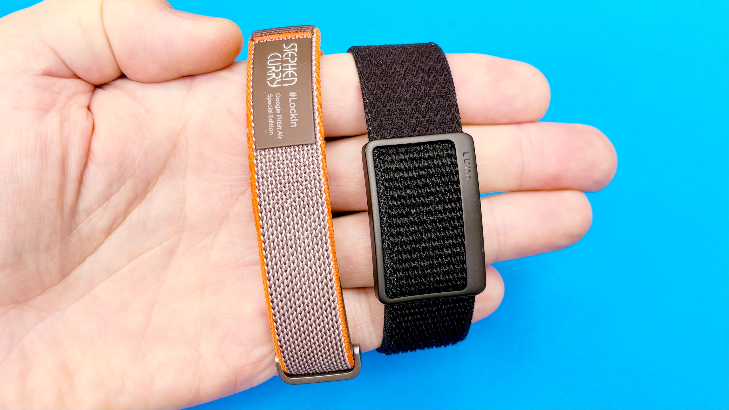 Close-up of the Luna Band next to the Fitbit Air