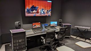 The control room with multiple Pro AV solutions designed by Meinteractive at Holy Cross.