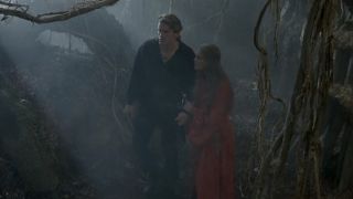 Westley and Buttercup walking through the Fire Swamp in the Princess Bride