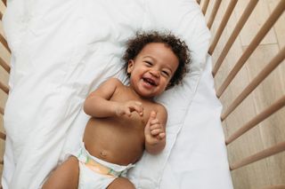 baby lying in a cot