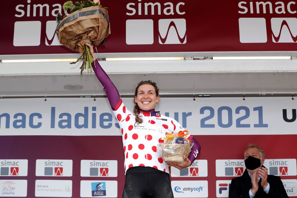 SWEIKHUIZEN NETHERLANDS AUGUST 28 Alison Jackson of Canada and Team Liv Racing celebrates winning the polka dot mountain jersey on the podium ceremony after the 23rd Simac Ladies Tour 2021 Stage 4 a 1489km stage from Geleen to Sweikhuizen SLT2021 UCIWWT on August 28 2021 in Sweikhuizen Netherlands Photo by Bas CzerwinskiGetty Images