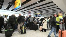 Passengers queuing and waiting for updates at Heathrow Airport after a cyber attack on Collins Aerospace disrupted operations on 20th September 2025.