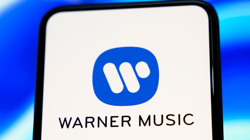 Warner Music Group logo on a phone