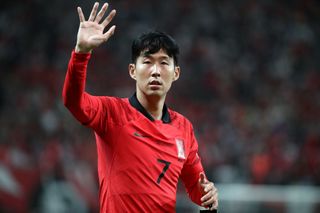 Son Heung-Min of South Korea celebrates after scoring his team's first goal during the South Korea v Cameroon - International friendly match at Seoul World Cup Stadium on September 27, 2022 in Seoul, South Korea.