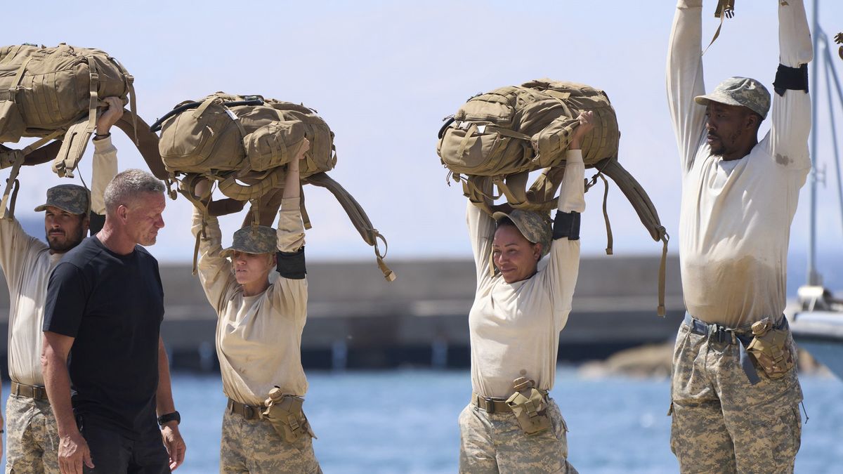 Director Staff Billy watching as contestants hold bags over their heads in Special Forces: World&#039;s Toughest Test