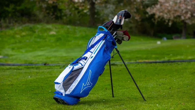 Mizuno K1-LO Stand Bag resting on the golf course in its blue colorway