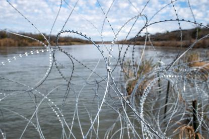 Razor wire is seen near the Rio Grande at Shelby Park on February 3, 2024 in Eagle Pass, Texas