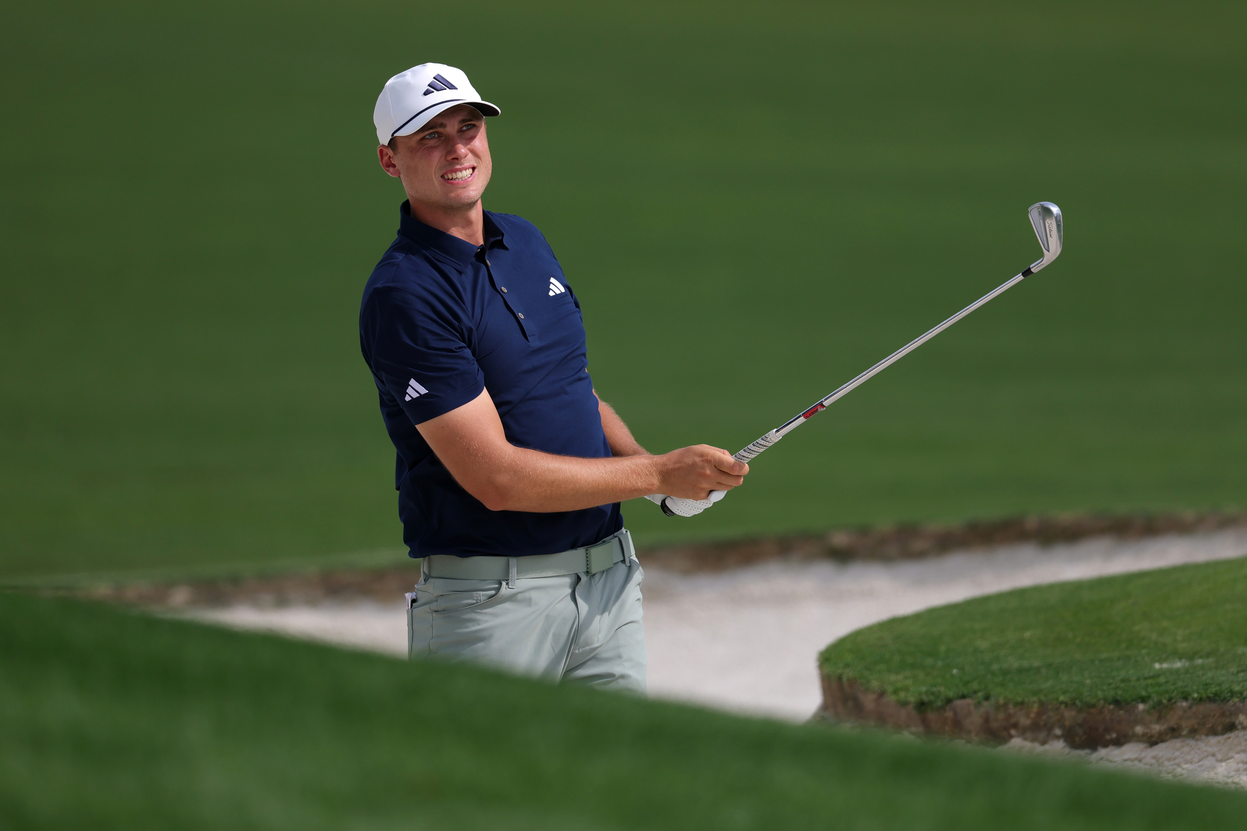 Ludvig Aberg hits a bunker shot