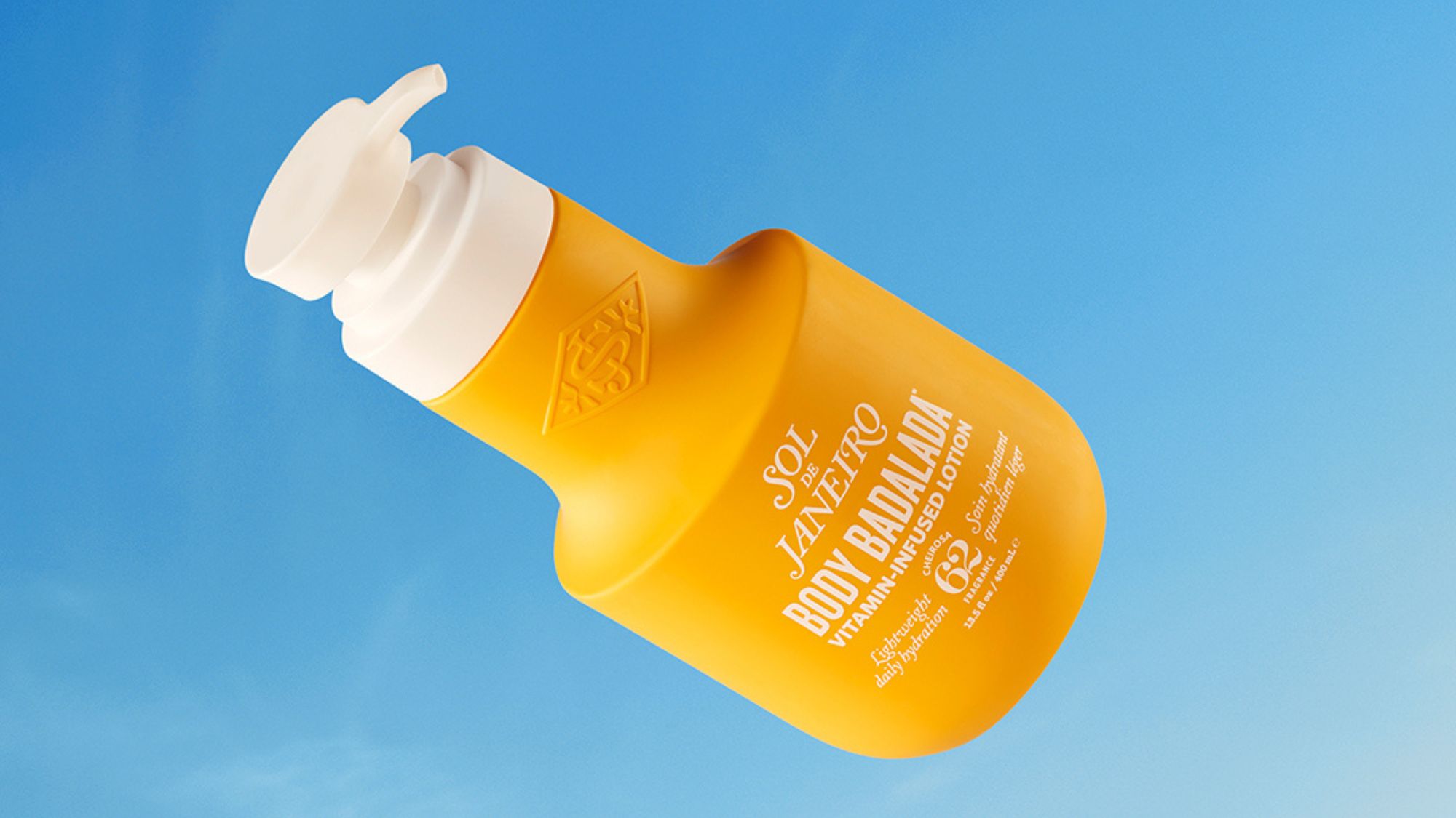 Sol de Janeiro Body Badalada Lotion on a blue background