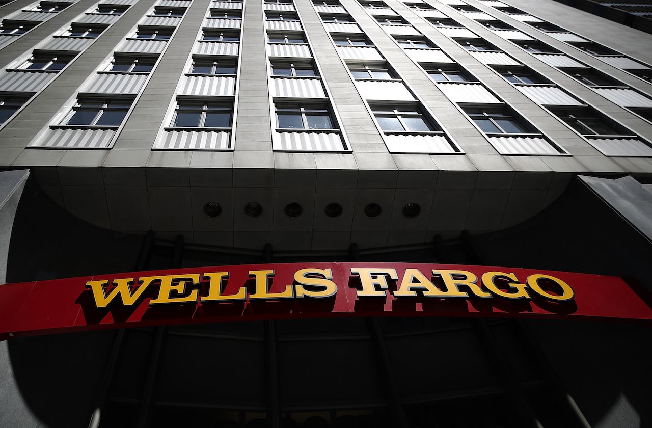 SAN FRANCISCO, CA - JULY 14:A sign is posted at a Wells Fargo Bank branch office on July 14, 2017 in San Francisco, California. San Francisco based Wells Fargo &amp;amp; Co. reported better-than-expe