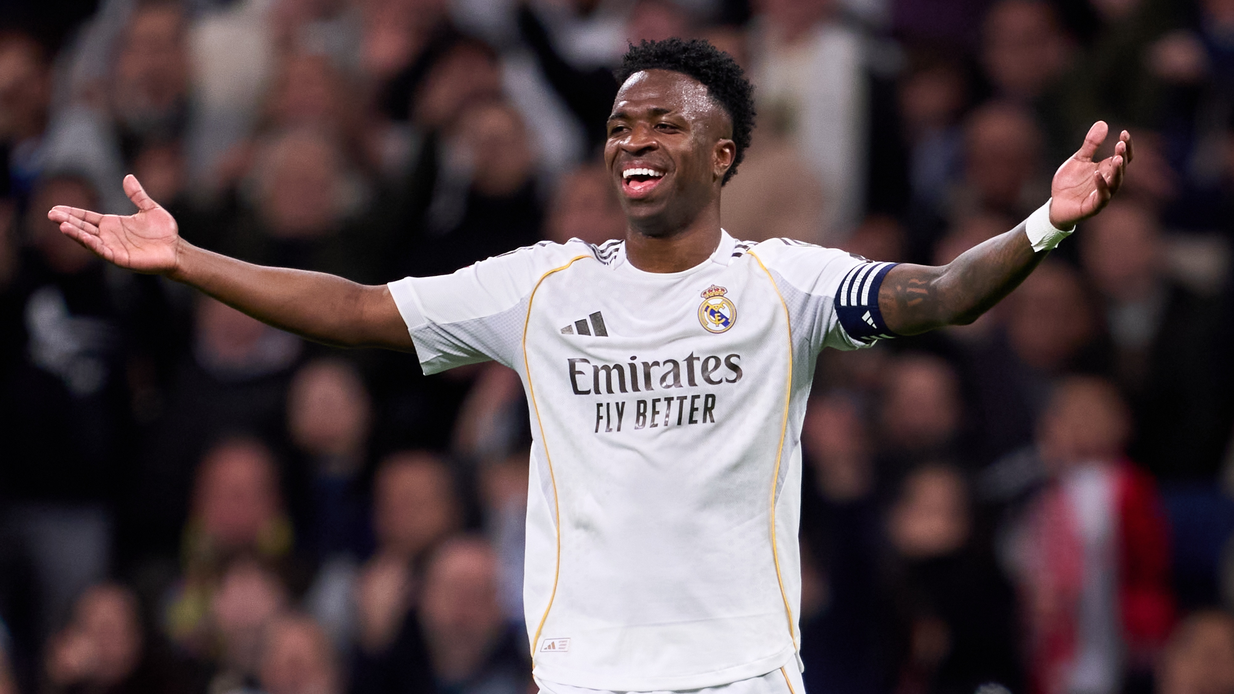 Vinicius Junior of Real Madrid reacts during the LaLiga EA Sports match between Real Madrid CF and Sevilla FC at Estadio Santiago Bernabeu on December 20, 2025 in Madrid, Spain. 