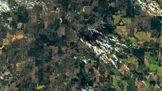 A track left behind by a devastating tornado that hit Mississippi on March 24, 2023, can be seen running across this image taken by NASA's Landsat-9 satellite.