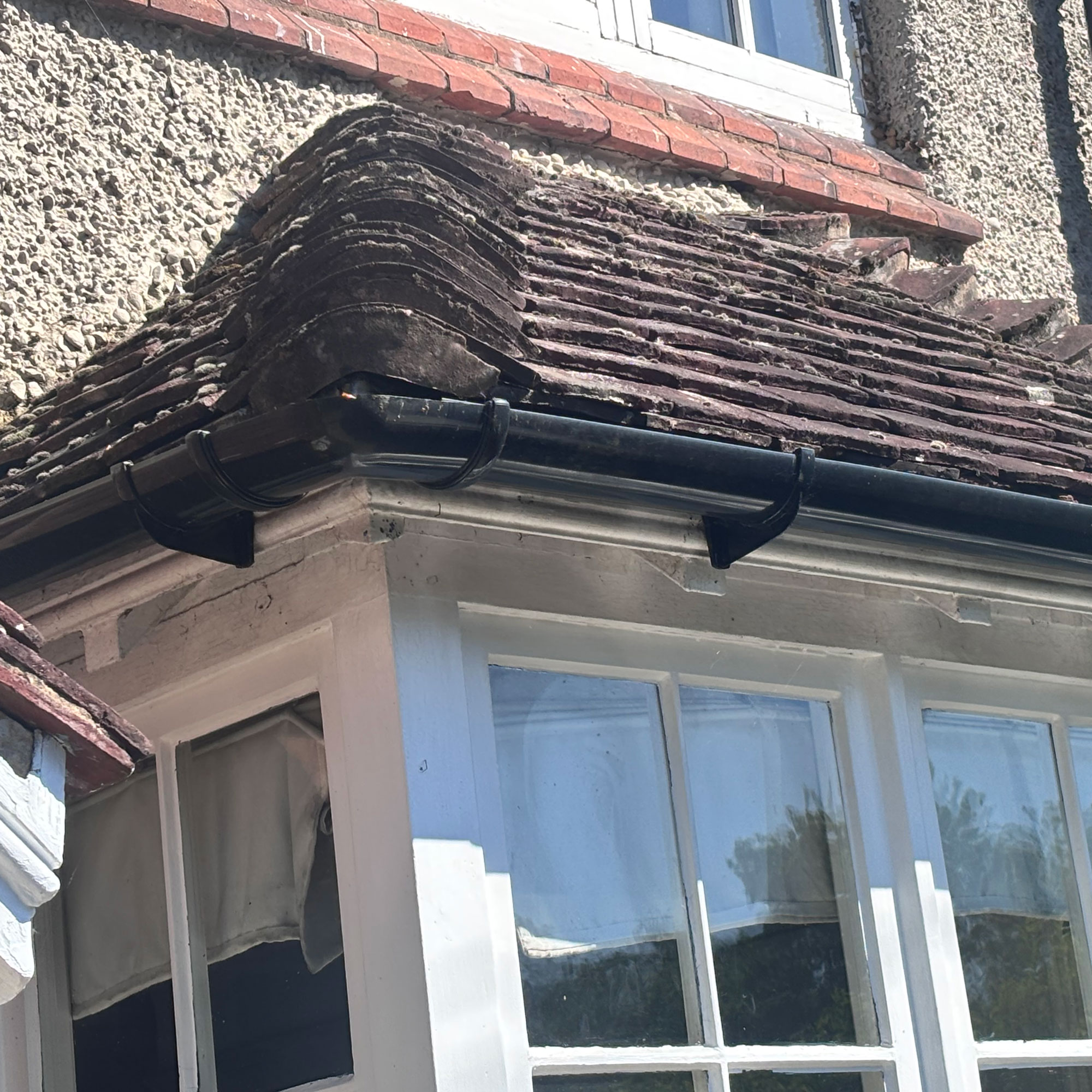 roof tiles with moss