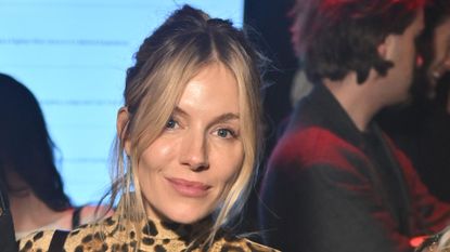 a headshot of sienna miller