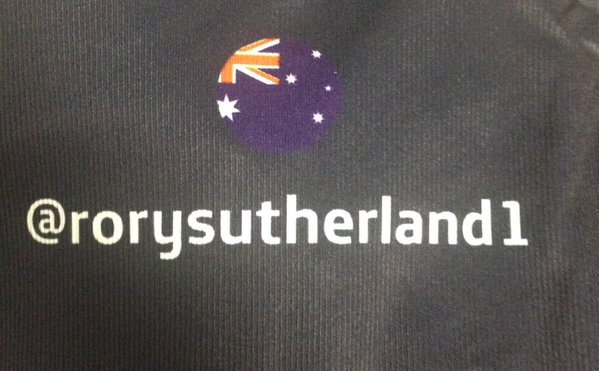 The rider's twitter handle and national flag feature on the jersey