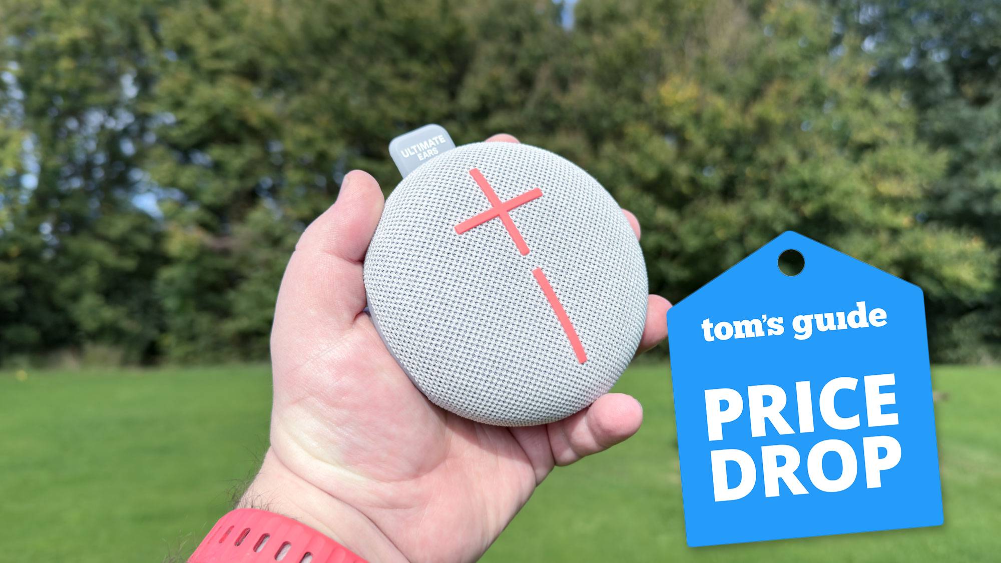 Ultimate Ears Miniroll portable Bluetooth speaker in hand