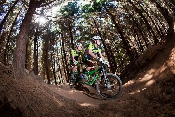 Sam Moss and Johan Slabber ride their tandem during the Cape Epic rologue