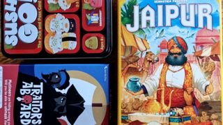 Jaipur box beside Sushi Go and Traitors Aboard packaging