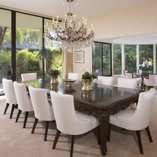 room with ceiling lamps and dining table with chairs