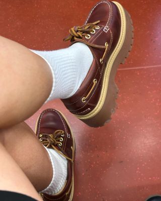 Rebecca Rhys Evans wears Timberland boat shoes.