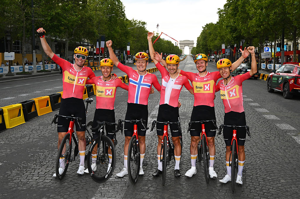 PARIS, FRANCE - JULY 26: Tobias Halland Johannessen of Norway, Jonas Abrahamsen of Norway, Magnus Cort of Denmark, Anders Halland Johannessen of Norway, Anders Skaarseth of Norway, Soren Waerenskjold of Norway and Team Uno-X Mobility react after the 113th Tour de France 2026, Stage 21 a 89km stage from Paris to Paris / #UCIWT / on July 26, 2026 in Paris, France. (Photo by Tim de Waele/Getty Images)