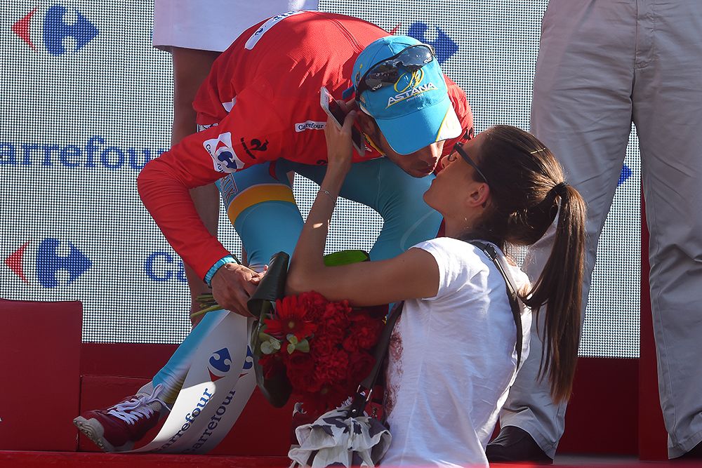 Fabio Aru celebrates on the stage 20 podium.