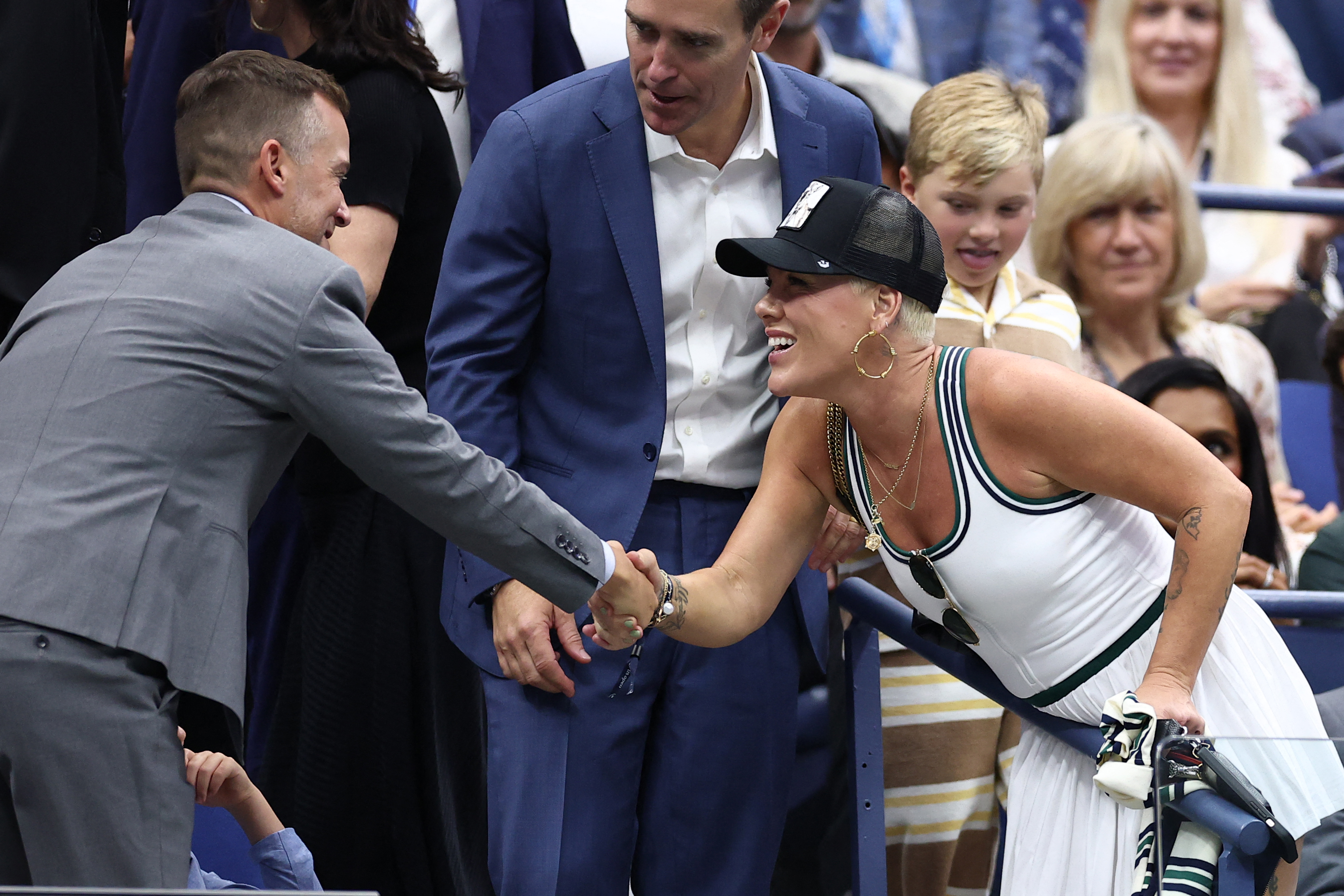the musician Pink wearing a white dress at the US Open