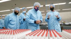 Australian Prime Minister Scott Morrison visits a facility producing the Oxford-AstraZeneca vaccine