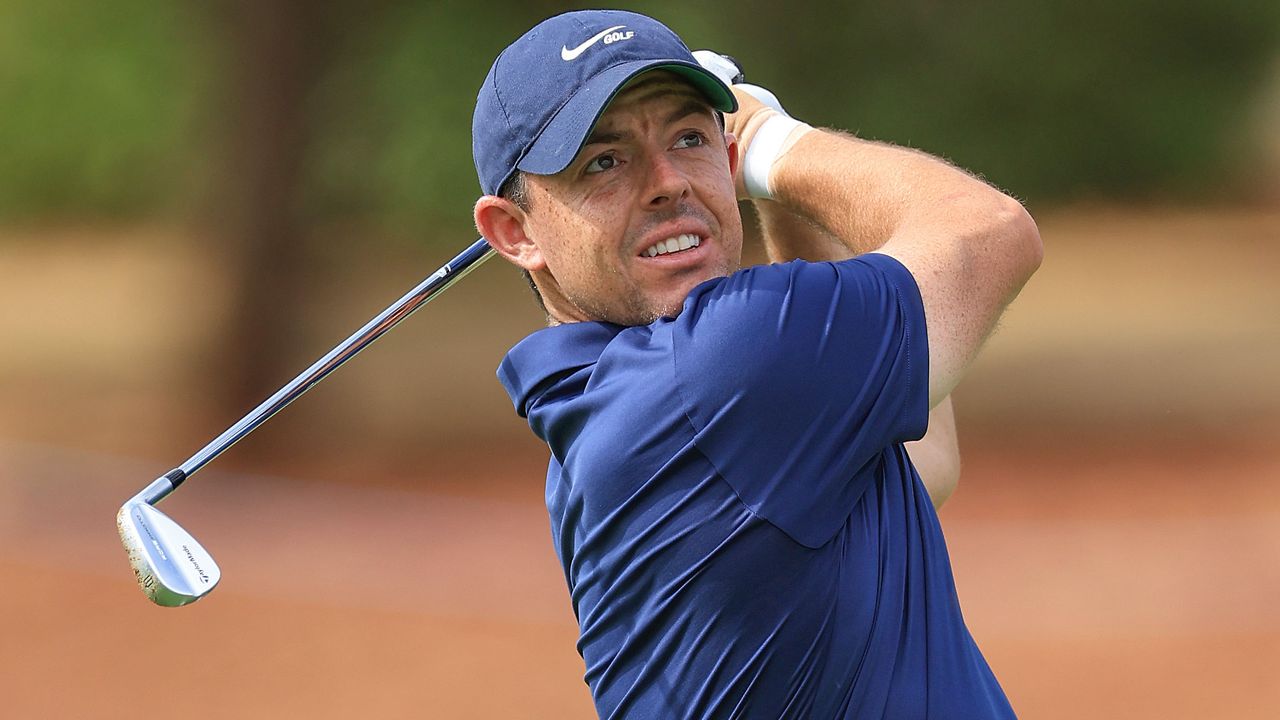 Photo of Rory Mcilroy using his rors protd irons