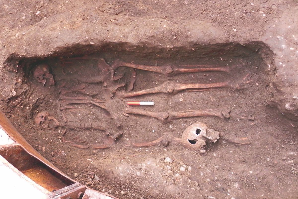 The skeletons of two men were found buried in a double grave in London, their fingers entwined.