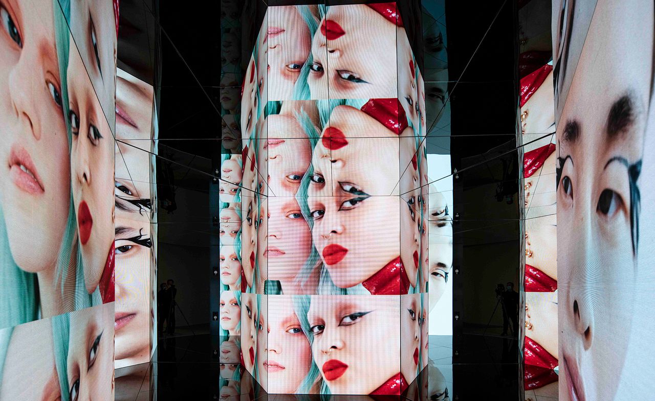 Image of woman&#039;s face wearing lipstick as installation view of ‘Re-Signify Part II&#039; exhibition