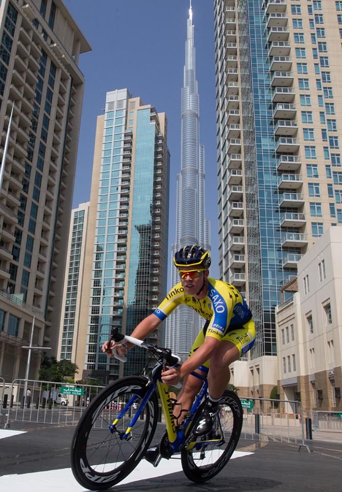 The riders were dwarfed by the huge skyscrapers in Dubai