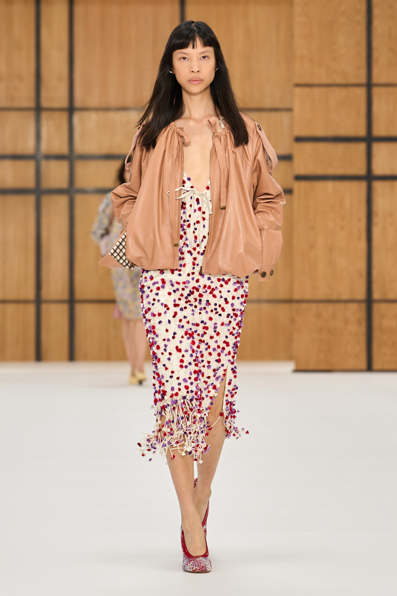 a model walks the burberry spring/summer 2027 runway.
