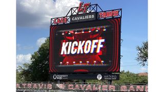 A new Watchfire video board signals kickoff to fans at a football game. 