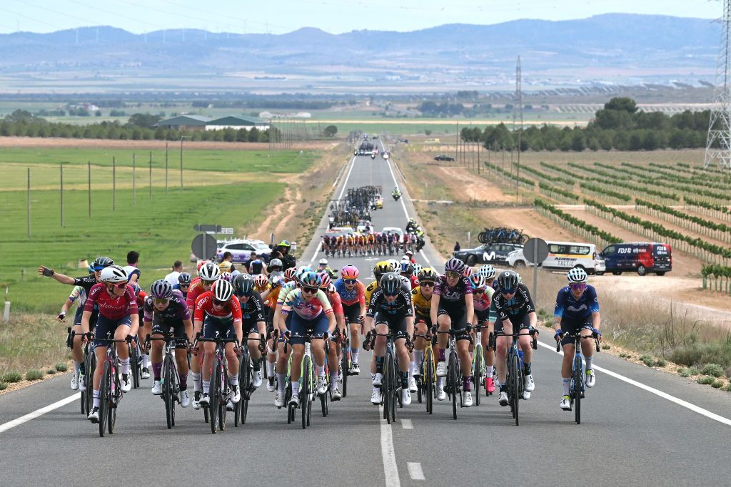 LA RODA SPAIN MAY 03 Demi Vollering of The Netherlands and Team SD Worx Pink UCI Womens WorldTour Leader Jersey Charlotte Kool of The Netherlands and Team DSM Green points jersey and a general view of the peloton competing during the 9th La Vuelta Femenina 2023 Stage 3 a 1578km stage from Elche de la Sierra to La Roda UCIWWT on May 03 2023 in La Roda Spain Photo by Dario BelingheriGetty Images