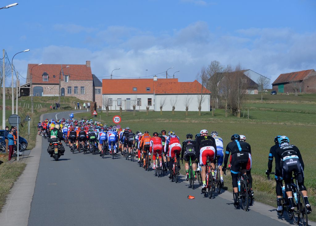 The peloton under blue skies