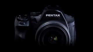 Close-up of a Pentax DSLR in shadow