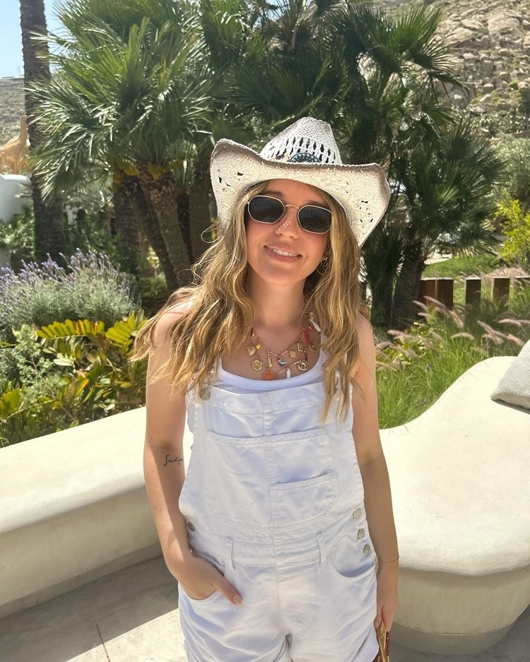 junior beauty editor grace lindsay on holiday in greece with blonde, wavy hair