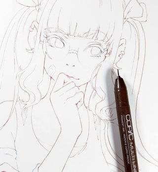 Ink pen next to character line drawing