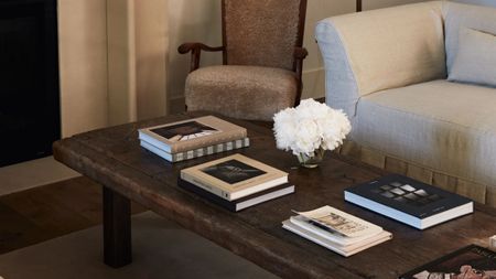an antique coffee table in a chic home