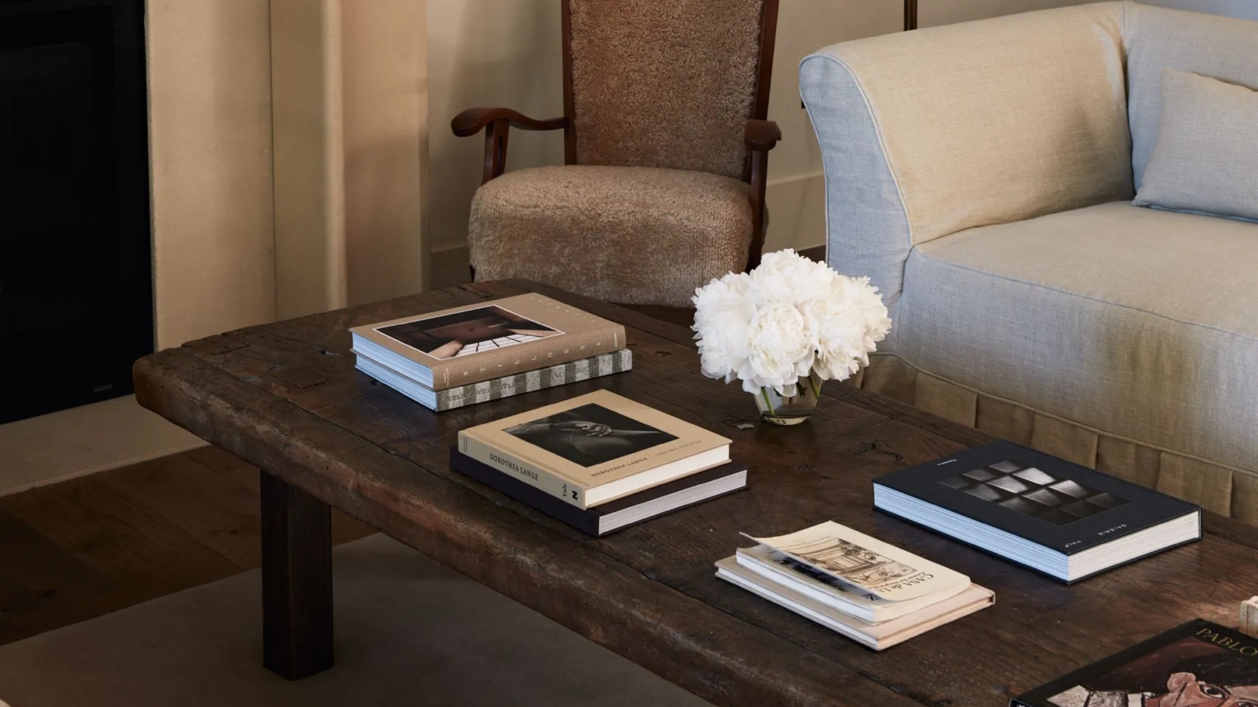 an antique coffee table in a chic home