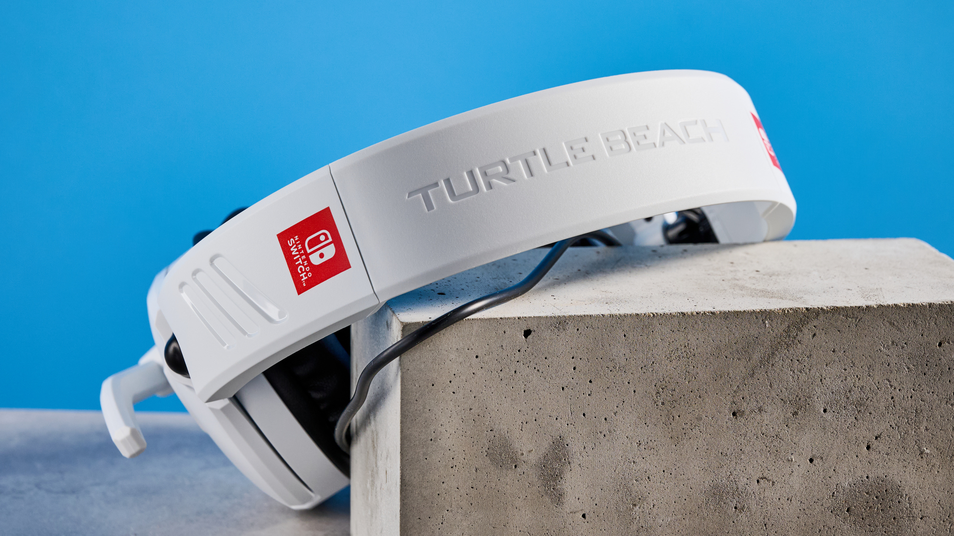 A white Turtle Beach Recon 70 wired gaming headset for Nintendo Switch