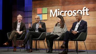 Microsoft executives, including CEO Satya Nadella, president Brad Smith, and CFO Amy Hood, pictured at the company's annual shareholder meeting in 2017.