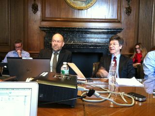 Climate scientists James Hansen (left) and economist Jeffrey Sachs discuss a new paper on limiting carbon dioxide emissions with reporters at Columbia University's Low Library on Dec. 3, 2013.